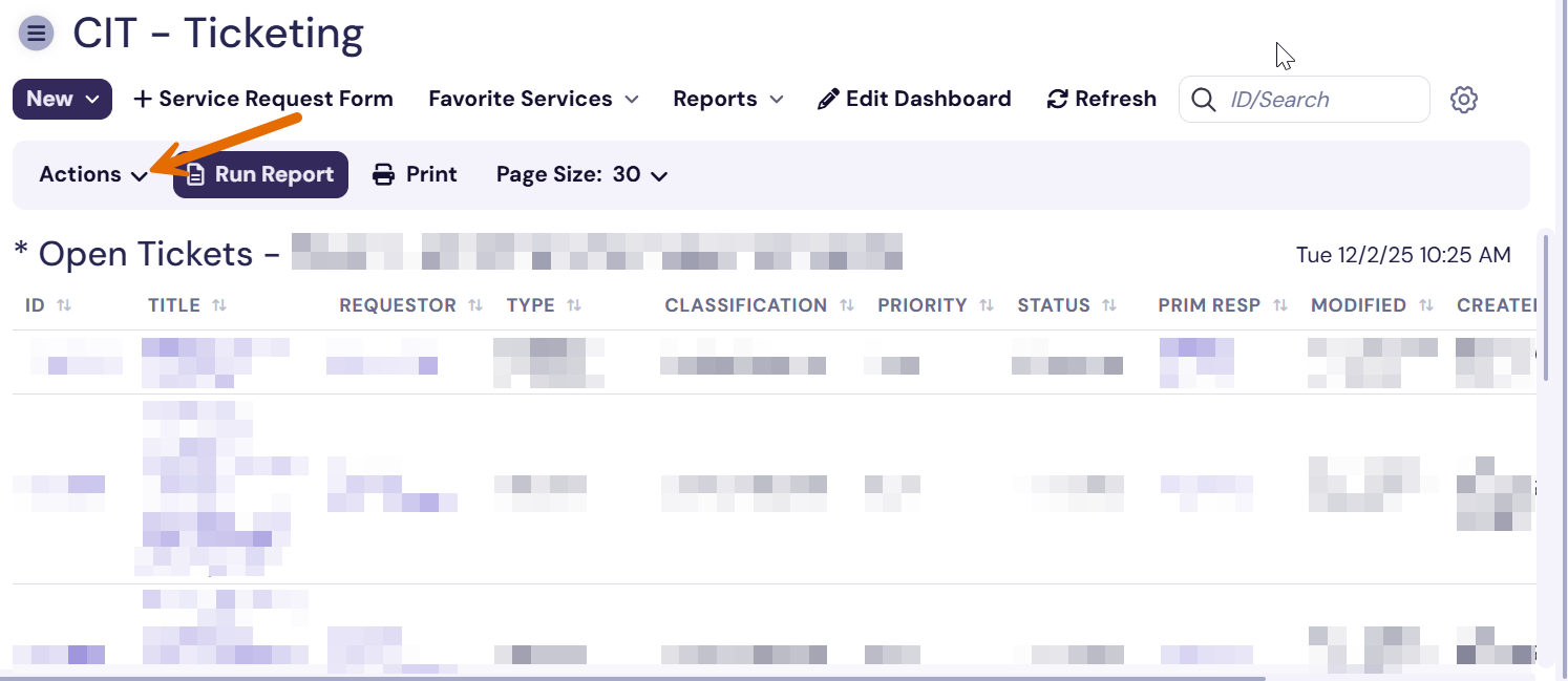 TDX report with arrow pointing at "Actions" dropdown menu.