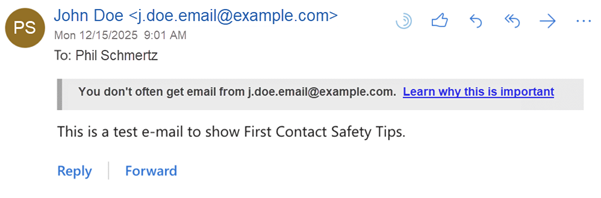 Email showing First Contact Safety Tip as dark warning text on a gray background at the top of an email