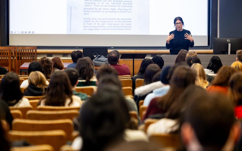 Instructor teaching a large class; © Cornell University, 301 College Ave, Ithaca, NY 14853; 607-255-7675; photo@cornell.edu.