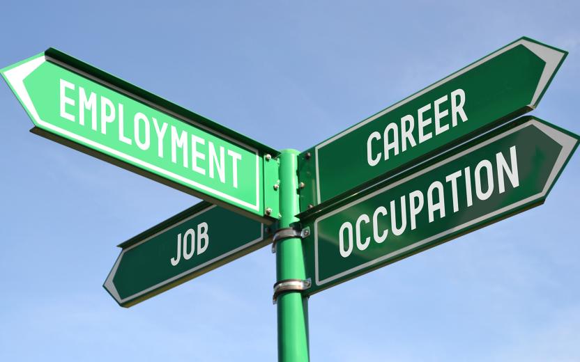 a street sign pointing to emploment and career options