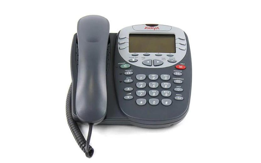 pushbutton desktop phone representing old technology