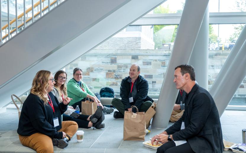Ben Maddox chats with participants during lunch.