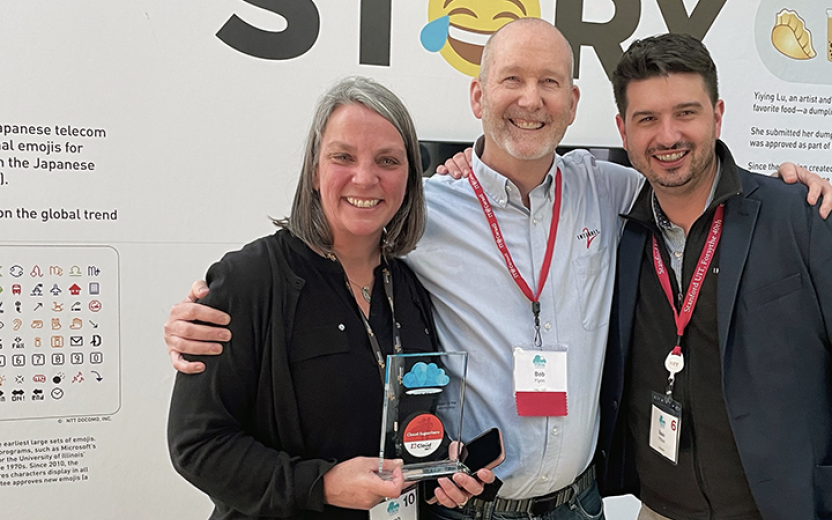 Sarah Christen being presented with the Cloud Superhero award from Internet2