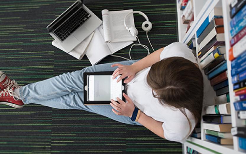 Student on library floor