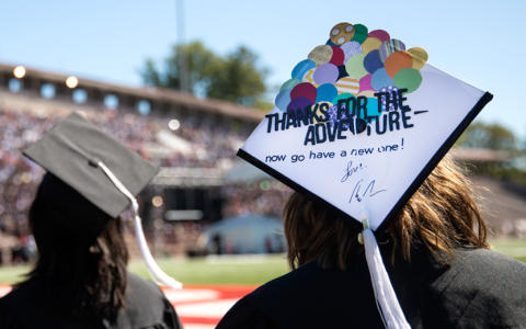 Graduates wearing a cap and gown