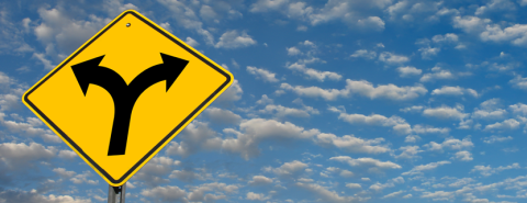 Street sign showing road split