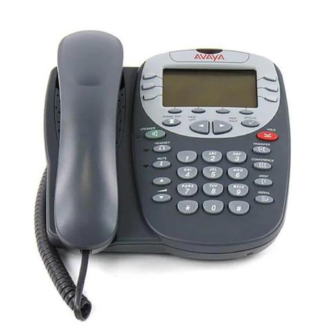 pushbutton desktop phone representing old technology