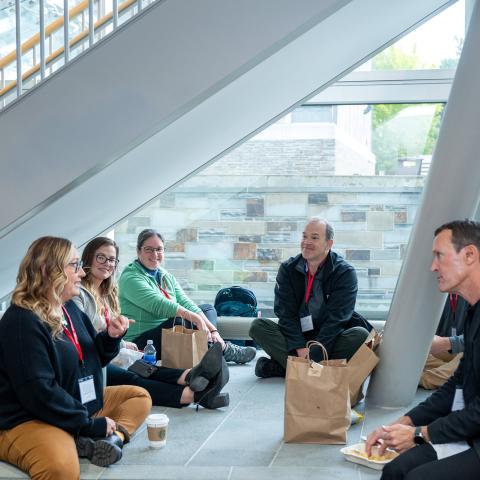 Ben Maddox chats with participants during lunch.