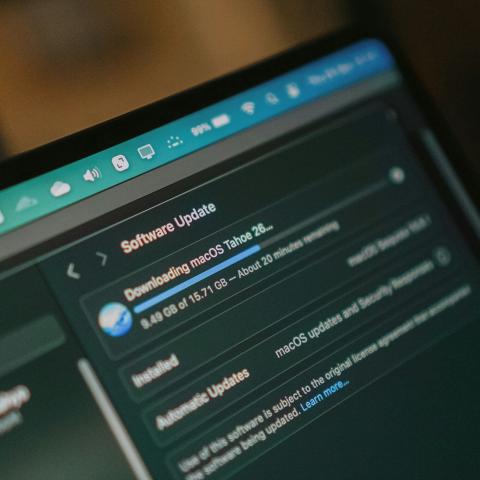 Laptop screen showing software update in progress.